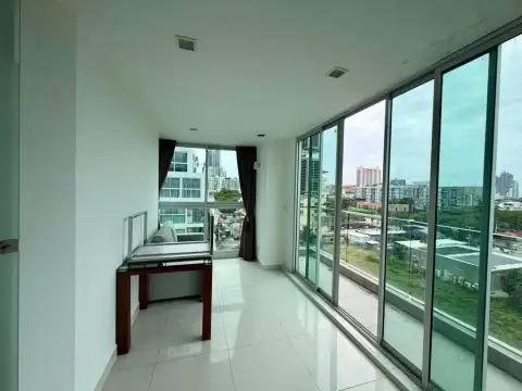 2 Bedroom Condo for Sale at Park Royal 3 bright balcony hallway overlooking city rooftops