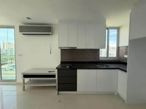 2 Bedroom Condo for Sale at Park Royal 3 kitchen with black countertops and white cabinetry