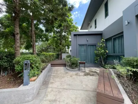 3 Bedroom House for Rent at Patta Define private garden patio with wooden deck and bench seating