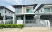 3 Bedroom House for Sale at Patta Define modern two-story exterior with gated driveway and carport
