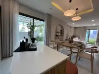 3 Bedroom House for Rent at Patta Element kitchen island counter overlooking dining room and garden view