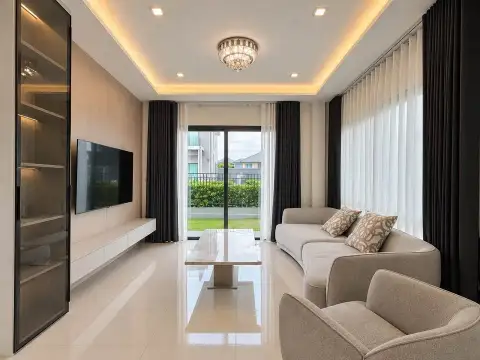 4 Bedroom House for Rent at Patta Element master bedroom with king bed, elephant artwork, and balcony access