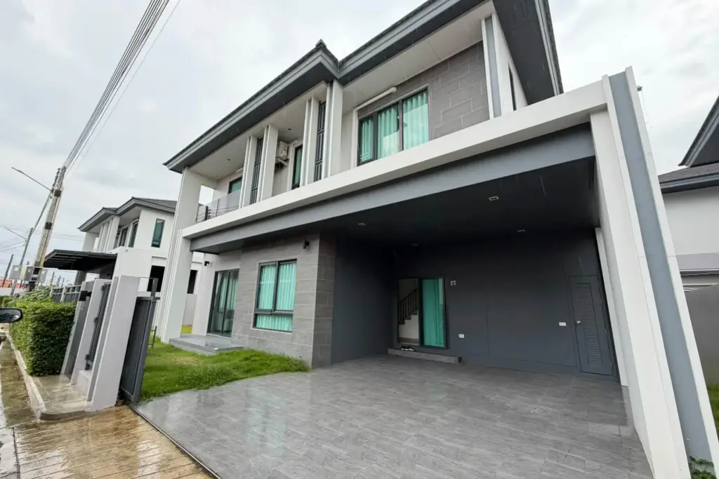 4 Bedroom House for Rent at Patta Element two-story modern exterior with covered carport and gated driveway