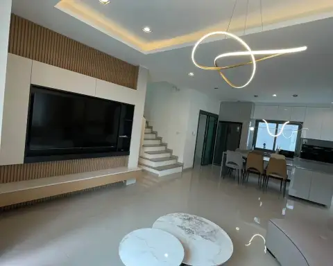 4 Bedroom House for Rent at Patta Element living and dining space with staircase and pendant lights