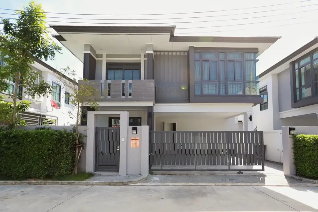 3 Bedroom House for Rent at Patta Prime modern two-story home exterior with sliding gate and driveway