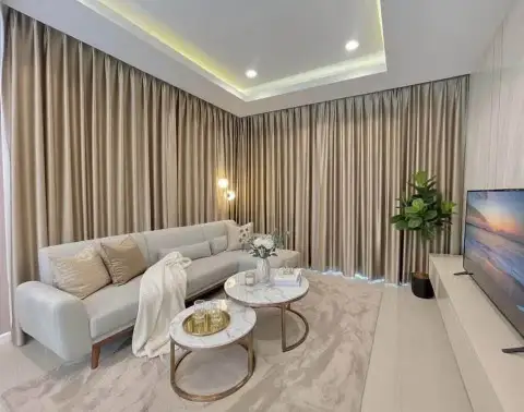 3 Bedroom House for Rent at Patta Ville elegant lounge with curtains, marble coffee tables and TV