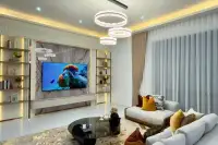 5 Bedroom House for Sale in Mabprachan modern lounge with marble TV wall ring chandelier and velvet sofas