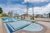 8 Bedroom House for Sale in Pratumnak Hill outdoor pool complex with kids wading pool, jacuzzi, and Pratumnak Hill skyline view