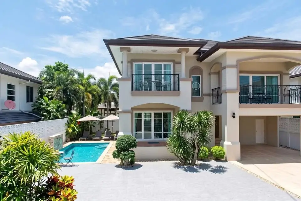 4 Bedroom House for Sale at Central Park Hillside two-story exterior with private pool and tropical garden