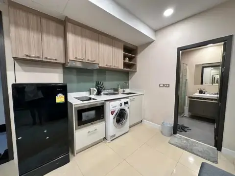 1 Bedroom Condo for Sale at Dusit Grand Condo View kitchenette with fridge, microwave and washing machine near bathroom
