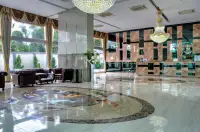 Studio Condo for Sale at Cosy Beach View grand lobby with marble floor medallion and crystal chandeliers