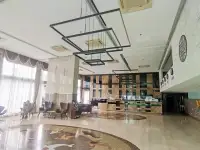 Studio Condo for Sale at Cosy Beach View modern lobby seating area with geometric ceiling light fixtures