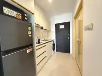 2 Bedroom Condo for Rent at Pattaya Heights kitchen with refrigerator, washing machine and marble backsplash