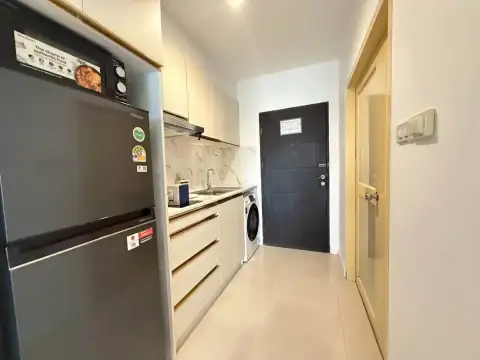 2 Bedroom Condo for Rent at Pattaya Heights kitchen with refrigerator, washing machine and marble backsplash
