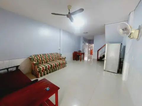 2 Bedroom House for Rent in Central Pattaya open living area with sofa, dining table and staircase