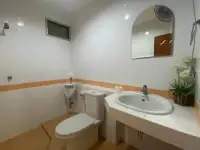 3 Bedroom House for Sale in Pattaya - bathroom with sink, mirror, and urinal fixture