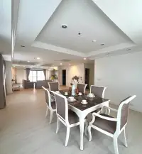 3 Bedroom House for Rent in Central Pattaya dining area with white table setting and open living space beyond