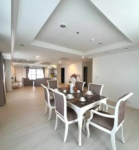 3 Bedroom House for Rent in Central Pattaya dining area with white table setting and open living space beyond