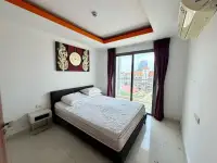 1 Bedroom Condo for Sale at C View Residence 2 bedroom with double bed and balcony overlooking city view