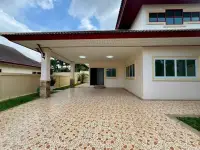 3 Bedroom House for Sale in Pattaya, covered carport with patterned tile flooring and entrance