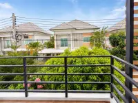 3 Bedroom House for Sale in East Pattaya balcony view overlooking neighboring houses and green garden