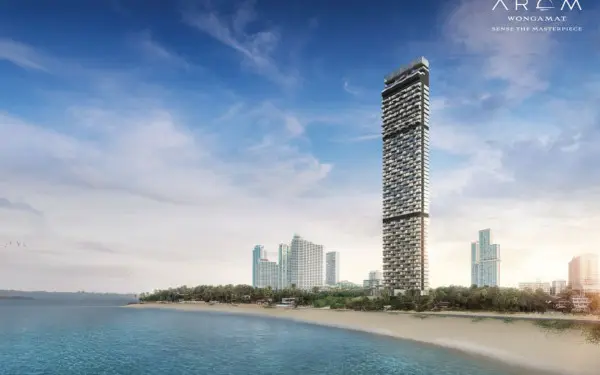 Arom Wongamat: Tall, modern skyscraper condo building on the beach overlooking the ocean in Pattaya.
