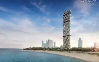 Arom Wongamat: Tall, modern skyscraper condo building on the beach overlooking the ocean in Pattaya.