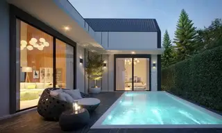 Celestial Villa Pattaya: Aerial view of multiple modern villas with gabled roofs, private pools, and lush landscaping.