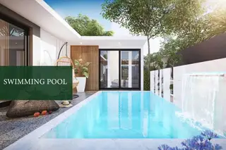 Baan Mae Pool Villa outdoor swimming pool with a waterfall feature, patio, and hanging chair.