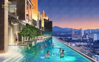 Copacabana Coral Reef high-rise condo building from a distance, with a city and ocean view at sunset.