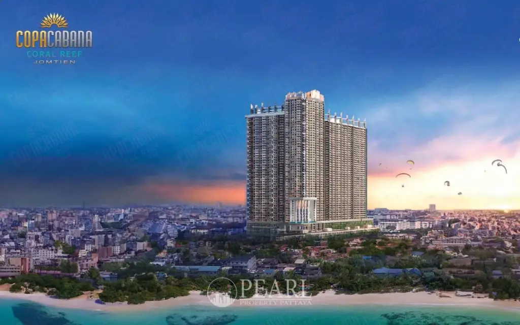 Copacabana Coral Reef Jomtien tower rising above Jomtien Beach at sunset