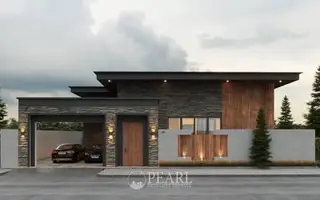 Reservoir Town living room with dark wood ceiling, large sofa, TV, and view into dining area.