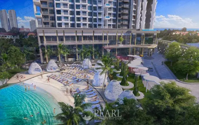 Copacabana Coral Reef infinity pool on a high floor, overlooking a city skyline under a blue sky.