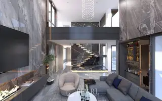 Alicera Ville luxurious living room with a large TV, fireplace, marble walls, and a grand staircase.