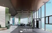2 Bedroom Condo for Sale at Aquarous Jomtien Pattaya modern fitness center with cardio equipment and floor-to-ceiling sea view windows