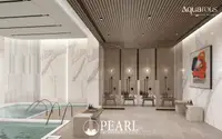 2 Bedroom Condo for Sale at Aquarous Jomtien Pattaya luxury spa with indoor pool marble walls and private shower stalls