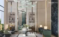 2 Bedroom Condo for Sale at Aquarous Jomtien Pattaya grand lobby with marble floors decorative shelving and leaf chandelier