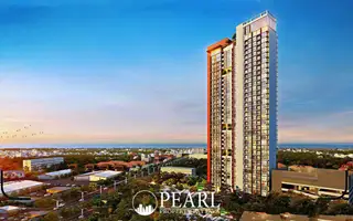 Pattaya Posh tall modern condo building exterior rendering with city and ocean views at sunset.