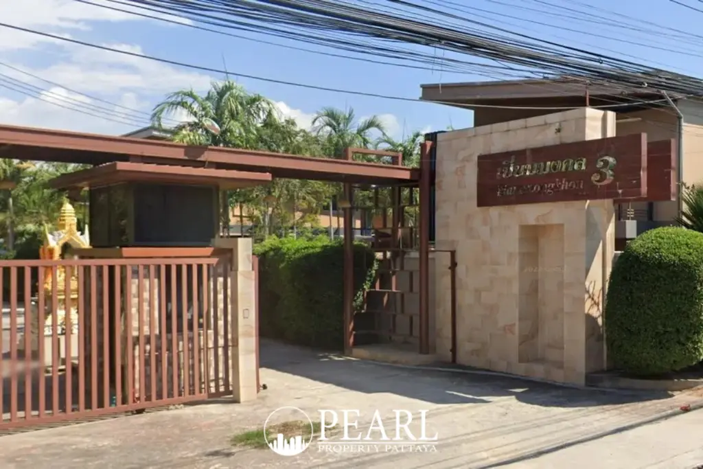 Baan Piam Mongkhon 3 entrance gate with stone wall and property name sign in Thai and English.