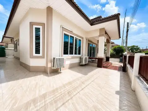 3 Bedroom House for Rent at PMC Home 4 side exterior with tiled patio, windows and perimeter fence