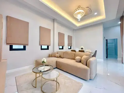 3 Bedroom House for Sale in Pong bright living room with beige sofa, marble floor and crystal chandelier