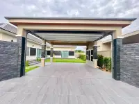 3 Bedroom House for Sale in Pong covered carport with stone pillars leading to home entrance