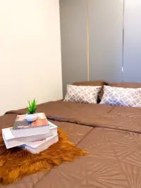 3 Bedroom House for Sale in Mabprachan bedside detail with books, plant, and faux fur throw on bed