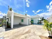 3 Bedroom House for Rent in Mabprachan exterior view with carport, rooftop deck and swimming pool
