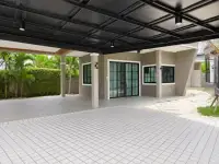 4 Bedroom House for Rent in Mabprachan covered patio with glass sliding doors and tiled driveway