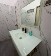 6 Bedroom House for Sale & Rent in Pratumnak Hill marble bathroom with floating sink and rain shower