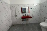 6 Bedroom House for Sale & Rent in Pratumnak Hill bathroom with red vanity sink and marble walls
