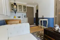 1 Bedroom Condo for Sale at Seven Seas Cote d'Azur, view of the compact kitchen and part of the living area.