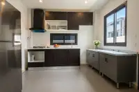 3 Bedroom House for Sale at Patta Define kitchen with dark cabinetry and gas stove