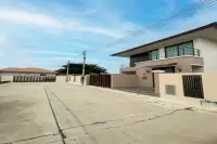 3 Bedroom House for Sale at Villa Asiatic wide concrete driveway and gated entrance with two-storey facade